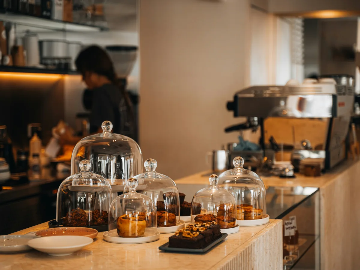 Representative stock photograph of café pastries; not food served by Iron Co